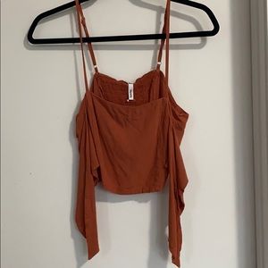 orange/brown top